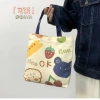 This cartoon and cute ins-style portable and artistic handbag is a must-have for shopping and strolling Application Scenario